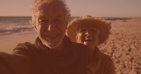 Senior Couple Enjoying Romantic Beachside Selfie - Download Free Stock Images Pikwizard.com