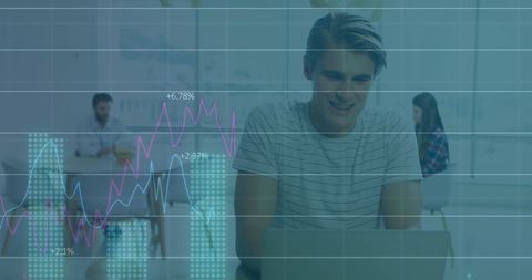Young Man Analyzing Data on Laptop with Overlaid Financial Graphics