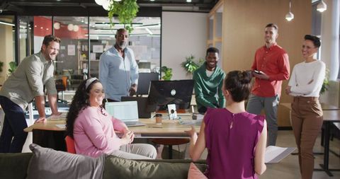 Diverse Team Engaging in Office Meeting for Creative Collaboration