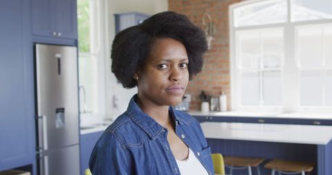 Confident African American Woman in Modern Kitchen Setting - Download Free Stock Images Pikwizard.com