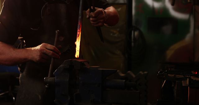 Blacksmith Shaping Heated Metal in Workshop - Download Free Stock Images Pikwizard.com