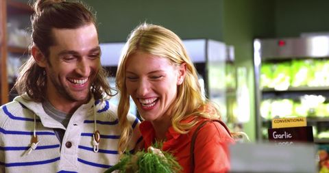 Happy Couple Shopping in Organic Grocery Market