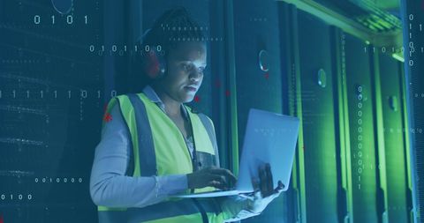 Female Engineer Working in High-Tech Data Center with Laptop - Download Free Stock Images Pikwizard.com
