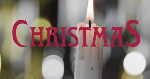 Christmas Text Over Lit Candle Background for Festive Celebration