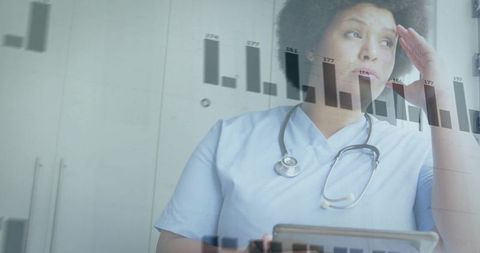 Nurse Analyzing Healthcare Data with Digital Tablet