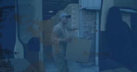 Courier lifting parcel from van and carrying to warehouse dock with logistics data overlay