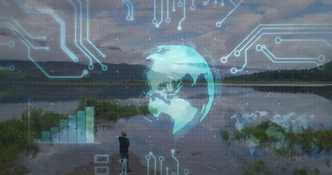 Woman standing at lake holding phone observing holographic globe and circuit overlay