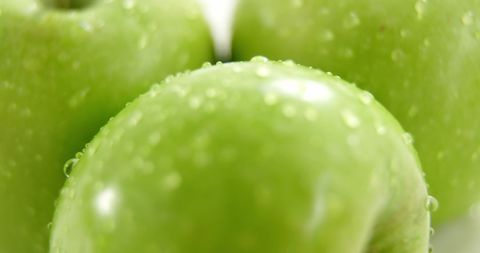 Fresh Dewy Green Apples with Water Droplets for Healthy Eating