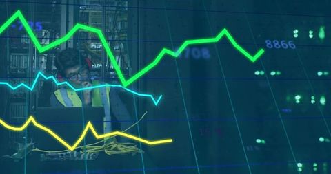 Data Center Technician Monitoring Network Performance on Laptop with Racks, Cables and Analytics Ove