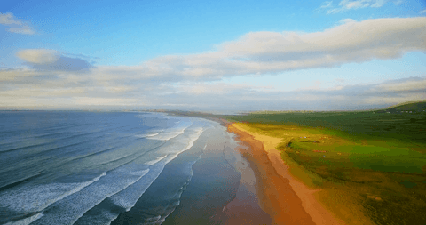 Transparent coastal beauty with endless horizon and blue sky