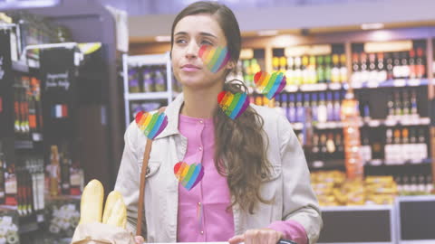 Woman in Supermarket With Rainbow Heart Graphics