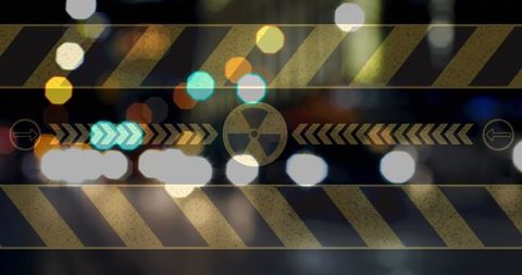 Nuclear symbol overlay on blurred city lights at night
