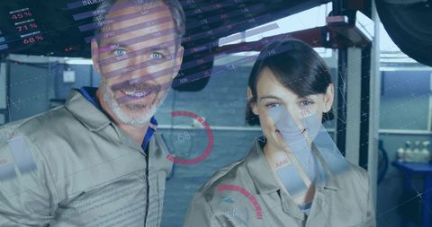 Technicians reviewing augmented reality diagnostic hud while inspecting vehicle on lift