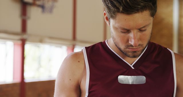 Basketball Player Focusing Before Game in Gymnasium - Download Free Stock Images Pikwizard.com