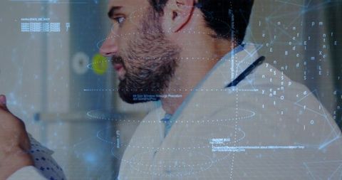 Doctor Providing Support to Patient Amid Advanced Medical Technology