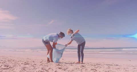 Diverse Volunteers Collecting Beach Litter with Careful Hygiene
