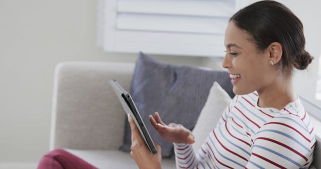 Happy Woman Video Calling on Tablet in Living Room - Download Free Stock Images Pikwizard.com