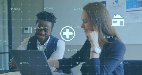 Diverse Business Team Collaborating with Digital Technology Overlay