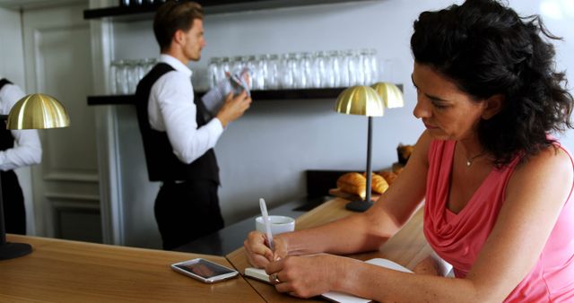 Professional Woman Working in Modern Cafe - Download Free Stock Images Pikwizard.com