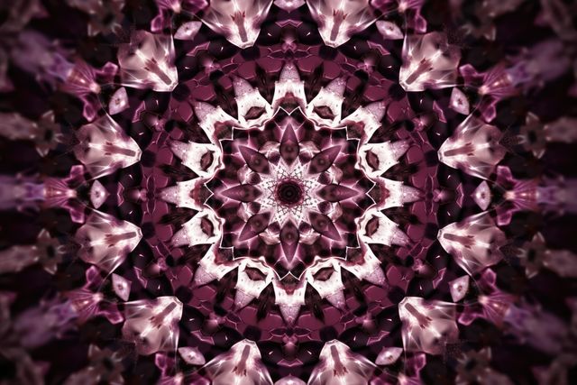 Close up of purple kaleidoscope shapes on black background created using generative ai technology. Abstract background and colour concept digitally generated image.