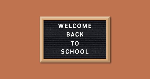 Welcome Back to School Sign on Orange Background - Download Free Stock Images Pikwizard.com