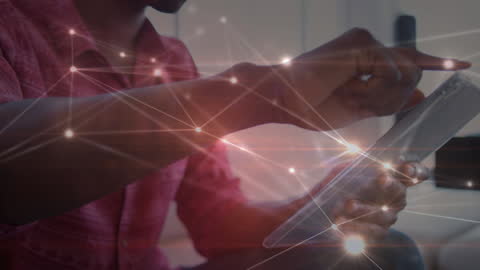 Man Using Tablet with Futuristic Digital Network Overlay