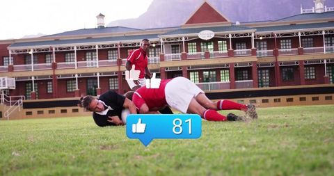 Rugby Players Tackle on Sunny Field with Social Media Encourage During Competition