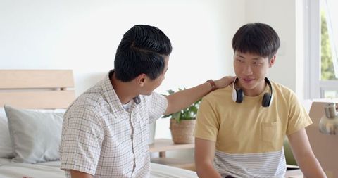 Father and Son Sharing Heartwarming Moment at Home