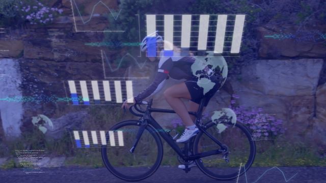 A woman is cycling on a road with a modern digital interface overlay depicting data processing elements like graphs and globes, conveying advanced technology and connectivity. This is ideal for visuals depicting fitness technology, global sports networks, or futuristic health monitoring tools.