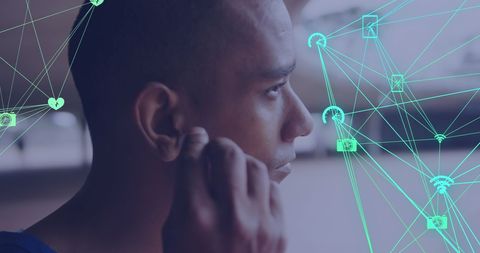 Athlete with wireless earphones linked to digital network of icons