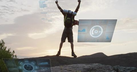 Hiker celebrating summit at sunset with augmented reality data panels and tech overlay