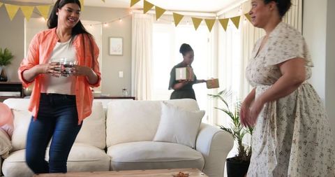 Diverse Women Celebrating Birthday at Home Party