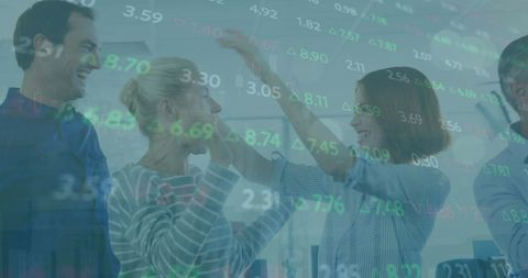 Business Team Celebrating Success with Stock Market Data Overlay