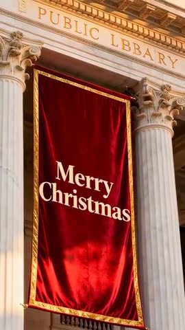 Scarlet Velvet Merry Christmas Banner Waving Between Corinthian Columns at Public Library