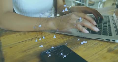 Female Professional Typing in Cafe with Digital Network Overlay