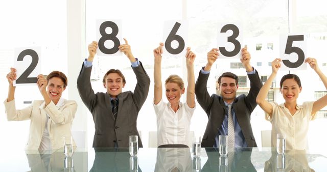 Business Team Holding Score Cards in Office Meeting Room - Download Free Stock Images Pikwizard.com