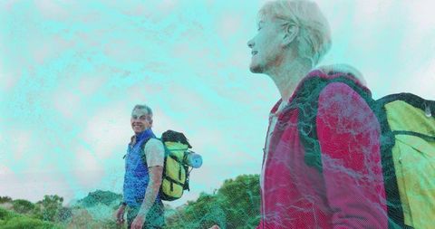 Happy Hiking Couple on Mountain Trail Adventure