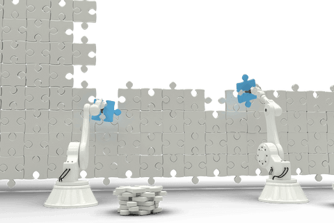 robots arranging transparent jigsaw puzzle pieces in industrial setting - Download Free Stock Videos Pikwizard.com