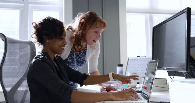 Diverse Female Colleagues Collaborating on Project in Modern Office - Download Free Stock Images Pikwizard.com