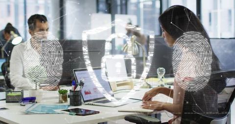 Biometric security in office, woman taking notes at desk with laptop and digital hud