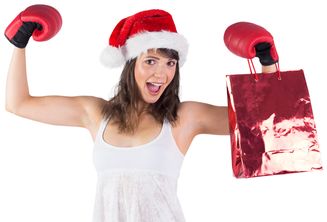 Woman Wearing Boxing Gloves And Santa Hat Holding Transparent Shopping Bag - Download Free Stock Videos Pikwizard.com