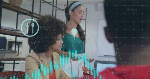 Diverse team working with ar data visualization in modern office