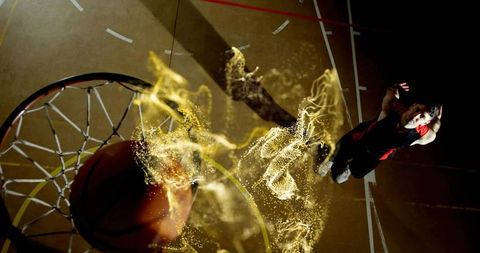 Dynamic Basketball Dunk with Energized Swirling Effects