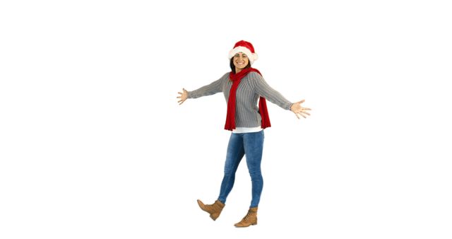 Joyful woman wearing Santa hat and winter clothes isolated on white background - Download Free Stock Images Pikwizard.com