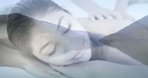 Woman Relaxing During Massage with Serene Mountain Lake Overlay