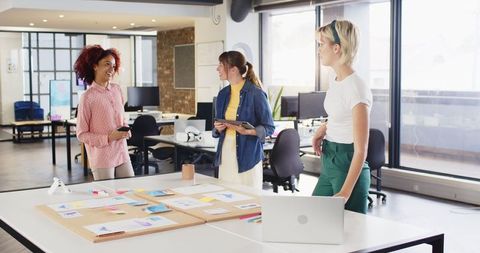 Diverse Team of Female Professionals Collaborating Brainstorming Ideas