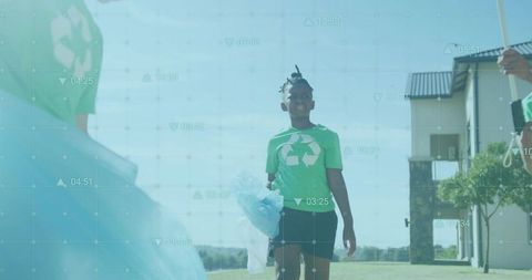 Eco-Conscious Boy Collecting Litter with Recycling T-Shirt in Neighborhood