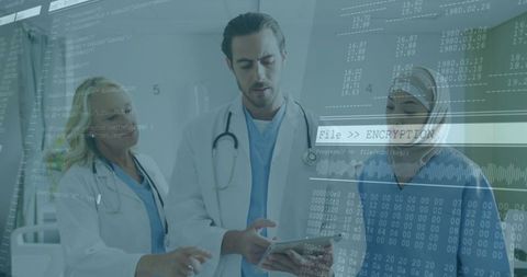 Medical professionals analyzing encrypted data on tablet
