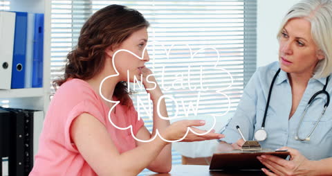 Doctor and Patient Engaged in Serious Consultation in Office