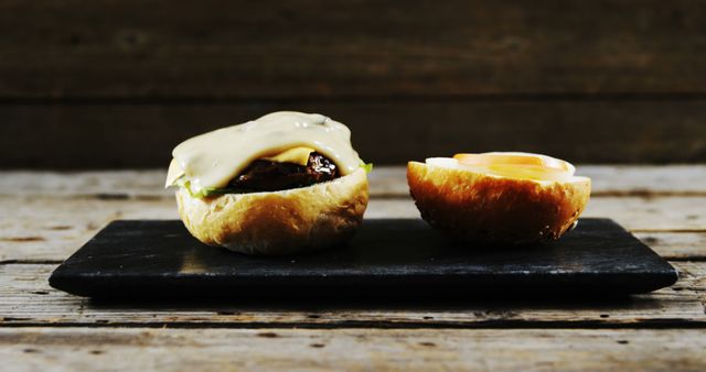 Gourmet Cheeseburger Preparation on Rustic Wooden Table - Download Free Stock Images Pikwizard.com